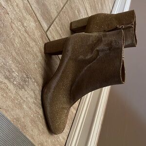 Free People gold glitter ankle boots. Res mark on the side that may come out.